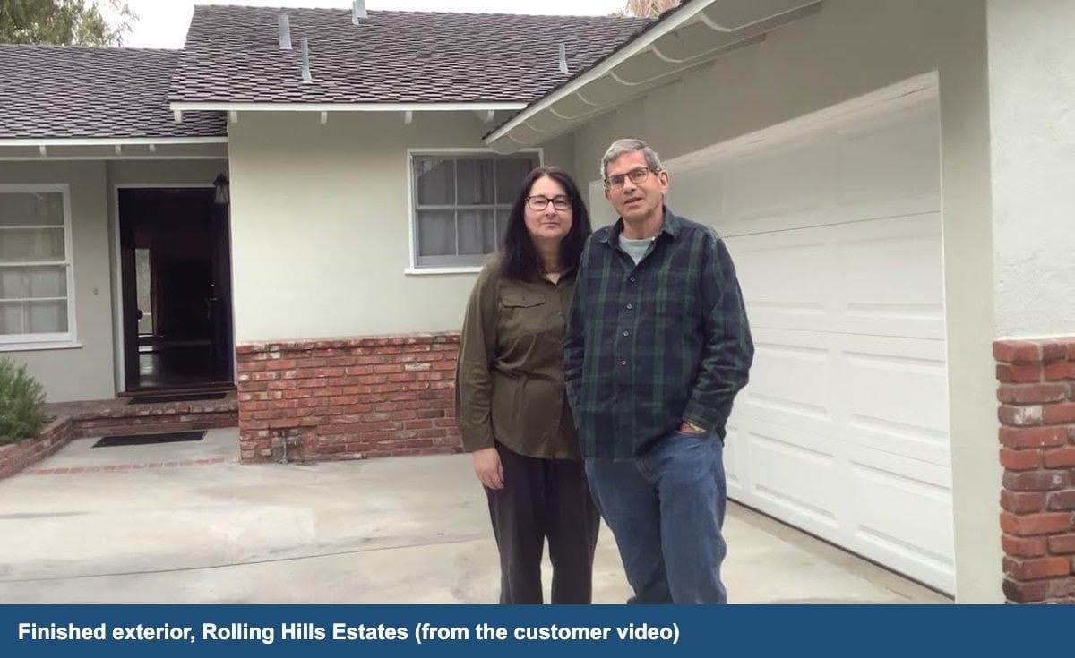 Single-story home in Rolling Hills Estates after an exterior repaint, gray-green walls with white trim and natural brick